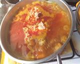 A picture of step 4 of Native palm oil jollof rice with a twist.