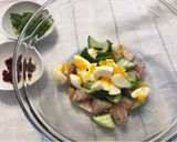 A picture of step 8 of Taro, Sweet Potato, Cucumber, and Cranberry Salad (with Egg and Fresh Basil).