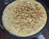 Foto del paso 4 de la receta: Tortilla de papas con cebolla caramelizada y pimiento del piquillo