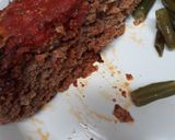 A picture of step 7 of Two Meatloaf in one pan.