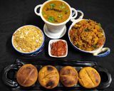 A picture of step 14 of Rajeshthani Thali (Dal Baati With Churma).