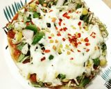 A picture of step 2 of Roasted Green Pepper Pita Bread Pizza.