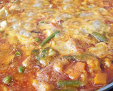 Foto del paso 5 de la receta: Arroz 'apaellado' de pulpo y chopitos
