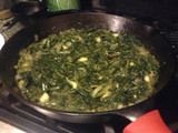 Dandelion Ka Saag. with grape tomatoes and blue cheese