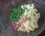 Foto del paso 3 de la receta: Tortilla de papas con cebolla, espinacas y jamón serrano