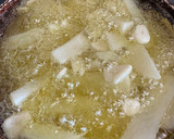 Foto del paso 2 de la receta: Patatas fritas con pimientos y ajos