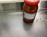 Une image de l'étape 10 de Poulet à la tomate, poivron jaune et cebettes.