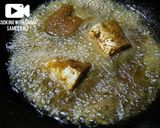 A picture of step 2 of Thai green rice with fried fish.