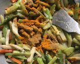 A picture of step 4 of Lentil Fritters in mix veg curry.