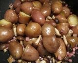 A picture of step 2 of Red russet potatoes with mushrooms and speck.