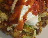 A picture of step 3 of Cheesy taco fiesta potatoes.