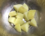 A picture of step 1 of Gobhi Matar Curry.