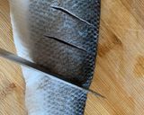 A picture of step 1 of Pan fried sea-bass with spicy nam pla prik dipping sauce.