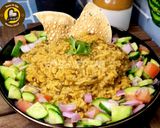 A picture of step 4 of Uttar Pradesh Urad Daal Aur Naye Chawal ki Khichdi Aloo Bharte Aur Hari Chutney (dinner or lunch).