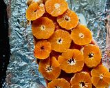 A picture of step 2 of Salmon with truffle tomato and tangerines.