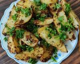 A picture of step 2 of Garlic Potatoes Wedges.