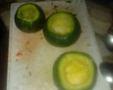 Foto del paso 2 de la receta: Zapallitos rellenos de pollo y queso