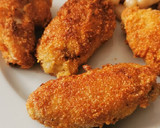 Foto del paso 7 de la receta: Alitas de pollo empanadas