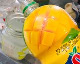 A picture of step 3 of Orangy Mango Cocktail.