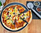 A picture of step 8 of Cheesy Veg Pizza.