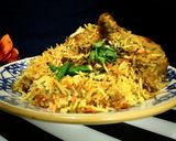 A picture of step 14 of Delhi's layered chicken Dum Biryani.