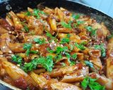 A picture of step 6 of Red sauce pasta.