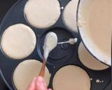 A picture of step 2 of Emoji coconut Pancake.