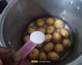 A picture of step 2 of Lasaniya Bhungla Batata.