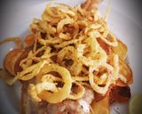A picture of step 6 of Fried European Sole on a Bed of Potatoes and Garlic with Onion Rings.