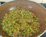 A picture of step 14 of Palak Methi Matar.