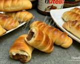 A picture of step 13 of Nutella stuffed caterpillar buns.
