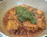 A picture of step 12 of Spinach Chicken with Coconut Milk.