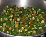 A picture of step 2 of Fry dal masala bhindi boiled rice potato Chokha salad papad.
