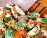 Foto langkah ke 4 dari resep Tumis terong bulat.