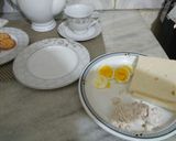 A picture of step 1 of Chicken egg sandwitch with tea.