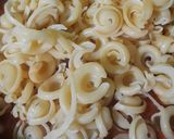 A picture of step 9 of Dischi Volanti Vegetable Bolognese.