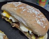 Foto del paso 5 de la receta: Sánduche🥯de pollo🍗y jamón🥓hawaiano🍍con queso🧀🥯🥪..