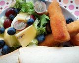 A picture of step 3 of Healthy Breakfast ~ Homemade Two-Color Jam Sandwich + Fruit and Lettuce Salad + Crispy Cod Sticks + Cranberry Sparkling Water.