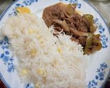 A picture of step 11 of Beef dry chilli with egg fried rice.
