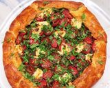 A picture of step 17 of Puttanesca galette with lemon ricotta.