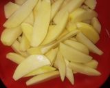 A picture of step 1 of Baked Potatoes wedges.