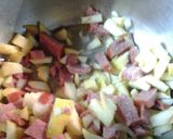 A picture of step 5 of Whole Roasted Chicken, stuffed with apples and sausage.