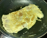 Foto del paso 5 de la receta: Bocadillo de tortilla jugoso y tierno