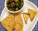 A picture of step 6 of Bhindi and Onion Fry with roasted cumin powder.