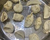 A picture of step 12 of Dumplings served with chilli oil and soya sauce dipping.