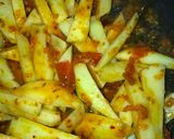 A picture of step 3 of Tawa masala fries.