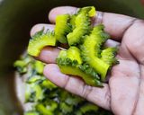 A picture of step 7 of Pavakkai /bitter gourd pitlai.