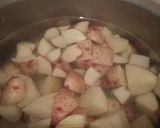 A picture of step 3 of Onion fried potatoes with fish and greens.