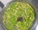 Foto langkah ke 1 dari resep Tumis bunga pepaya.