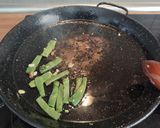 A picture of step 4 of Chicken and Vegetable Paella.